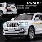 Toyota Land Cruiser Prado de control remoto a escala 1:24 con licencia de Chezhi, modelo de aleación fundida a presión. Control remoto con avance/retroceso, dirección y bocina. Colección de vehículos todoterreno.