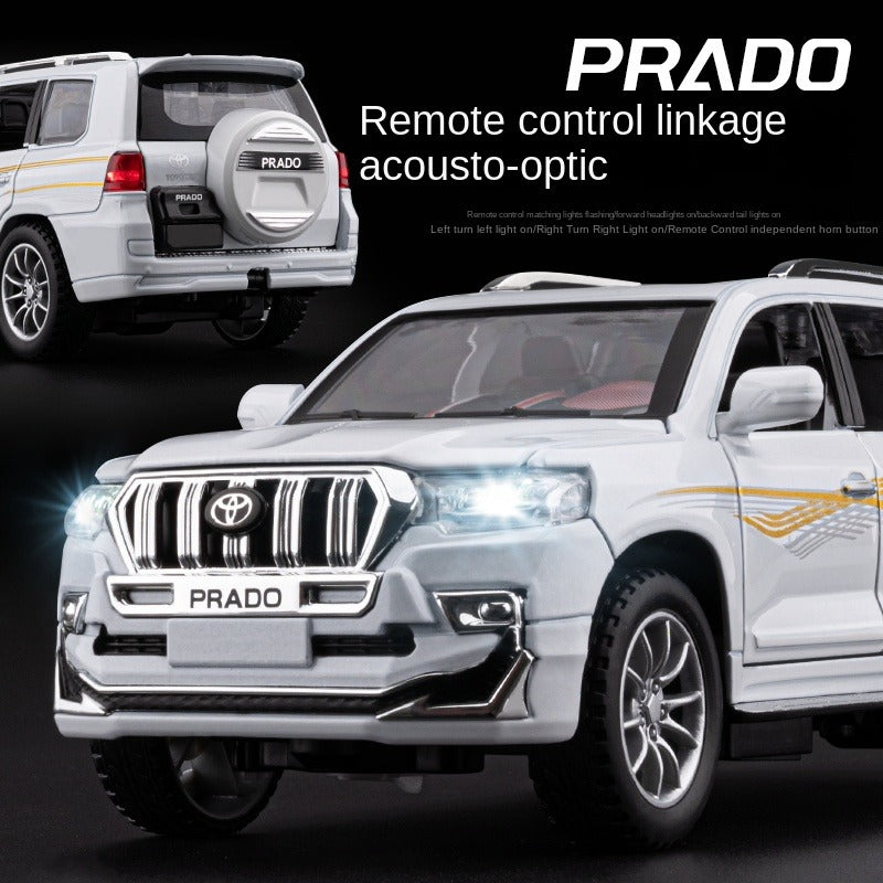 Toyota Land Cruiser Prado de control remoto a escala 1:24 con licencia de Chezhi, modelo de aleación fundida a presión. Control remoto con avance/retroceso, dirección y bocina. Colección de vehículos todoterreno.