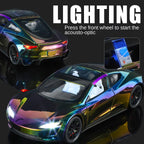 Tesla Roadster a escala 1:24, modelo de aleación fundida a presión, techo desmontable, puertas que se abren, sonido e iluminación, función de retroceso, amortiguación, dirección, bocina y alerón trasero ajustable. Colección de superdeportivos eléctricos.