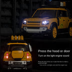 OK 1:18 Scale Die-Cast Alloy Model Toy Compatible with Land Rover Defender - Camel Trophy / Gulf Oil Liveries, with Roof Accessories, Opening Doors, Sound & Light, Shock Absorption, Steering & Horn - Classic Off-Road Collection
